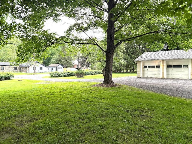 284 Titusville Rd, Poughkeepsie, NY 12603 - view of green lawn with a detached garage