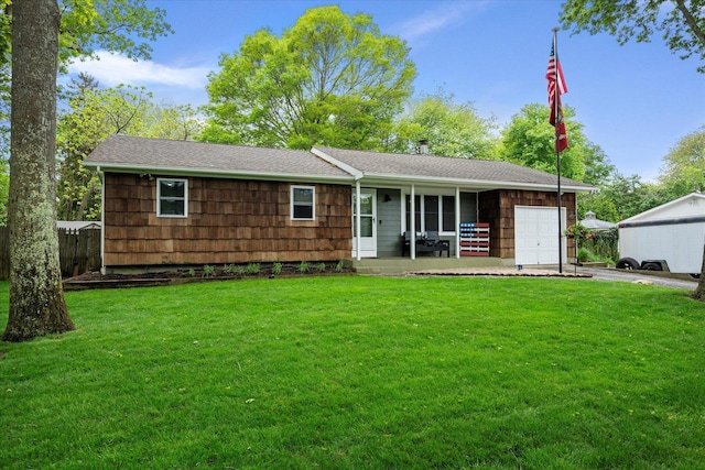 12 Debragga Ave, East Moriches, NY 11940 - single story home featuring a porch, a garage, a front yard, driveway, and roof with shingles