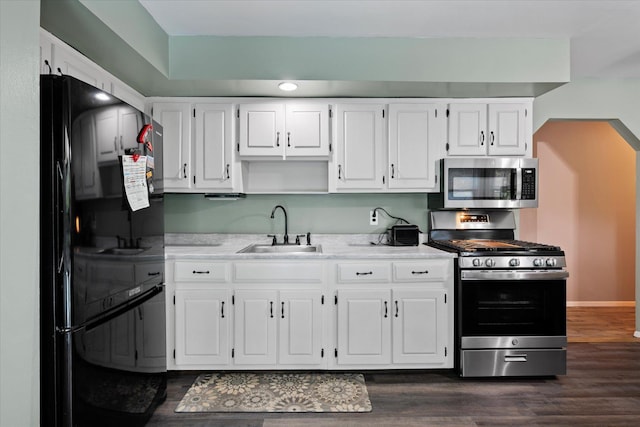 12 Debragga Ave, East Moriches, NY 11940 - kitchen featuring stainless steel appliances, a sink, and white cabinetry