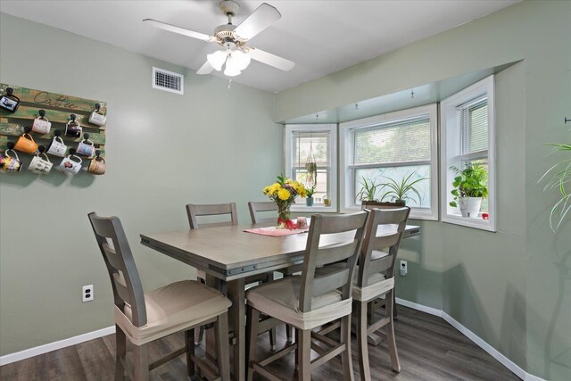 12 Debragga Ave, East Moriches, NY 11940 - dining space featuring wood finished floors, baseboards, and ceiling fan