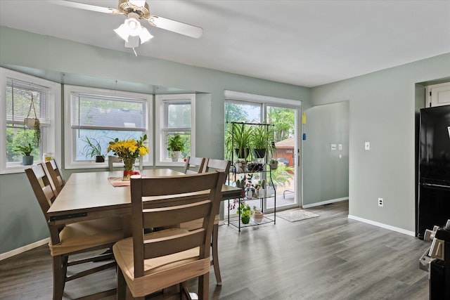 12 Debragga Ave, East Moriches, NY 11940 - dining space with wood finished floors, baseboards, and ceiling fan