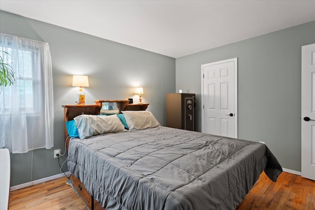 12 Debragga Ave, East Moriches, NY 11940 - bedroom with wood finished floors and baseboards