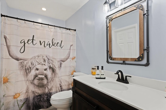 12 Debragga Ave, East Moriches, NY 11940 - full bath featuring toilet, vanity, a shower with shower curtain, and recessed lighting