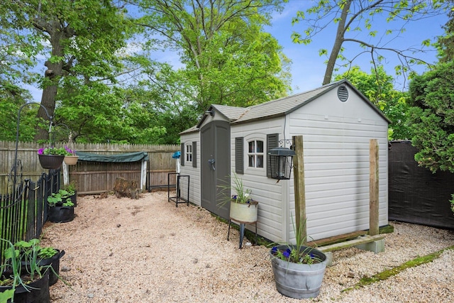 12 Debragga Ave, East Moriches, NY 11940 - view of shed featuring a fenced backyard