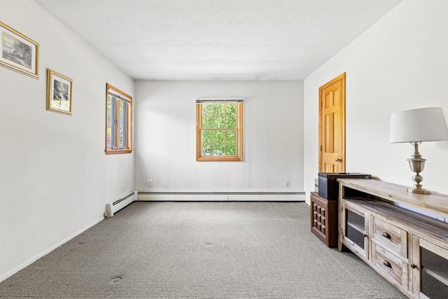 18 Stuyvesant Cir E, East Setauket, NY 11733 - interior space featuring carpet floors, baseboard heating, and baseboards