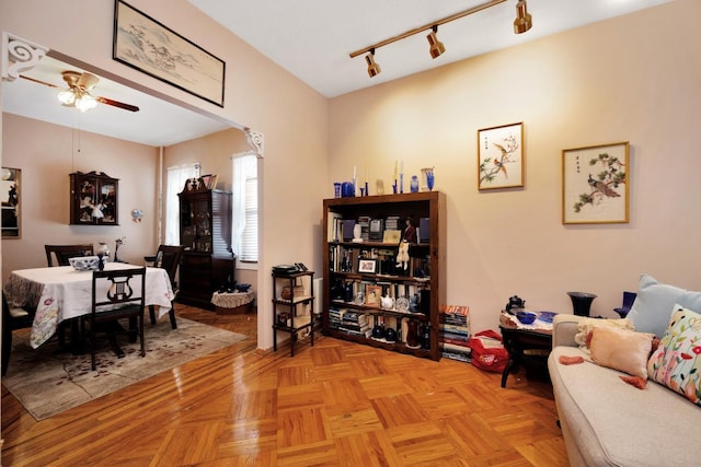 69-59 74th St, Middle Village, NY 11379 - living area with a ceiling fan and track lighting