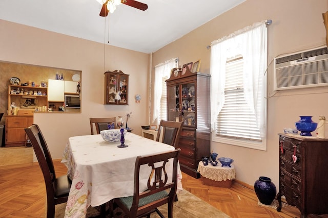 69-59 74th St, Middle Village, NY 11379 - dining space with ceiling fan and an AC wall unit