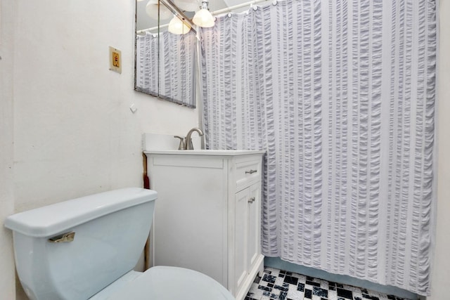 69-59 74th St, Middle Village, NY 11379 - full bathroom with toilet, vanity, tile patterned floors, and curtained shower