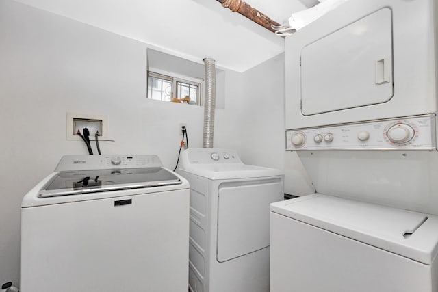 69-59 74th St, Middle Village, NY 11379 - laundry area with stacked washer and clothes dryer