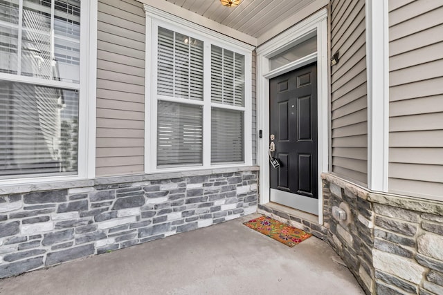 37 Lindentree Ln, Middletown, NY 10940 - entrance to property featuring stone siding and a porch