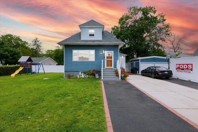545 Mount Ave, West Babylon, NY 11704 - view of front facade with a playground and roof with shingles