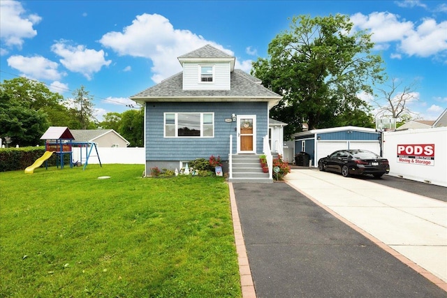 545 Mount Ave, West Babylon, NY 11704 - bungalow with roof with shingles and a playground
