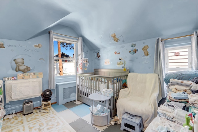 34-08 Murray Ln, Flushing, NY 11354 - bedroom with vaulted ceiling, wallpapered walls, and a crib