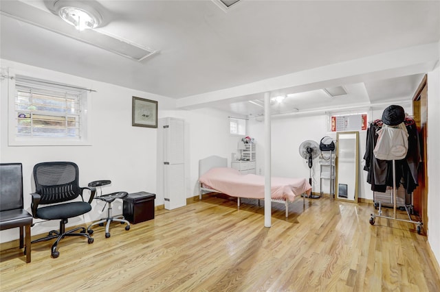 34-08 Murray Ln, Flushing, NY 11354 - bedroom featuring wood finished floors, attic access, and baseboards