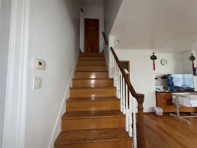 34-08 Murray Ln, Flushing, NY 11354 - stairway featuring wood finished floors