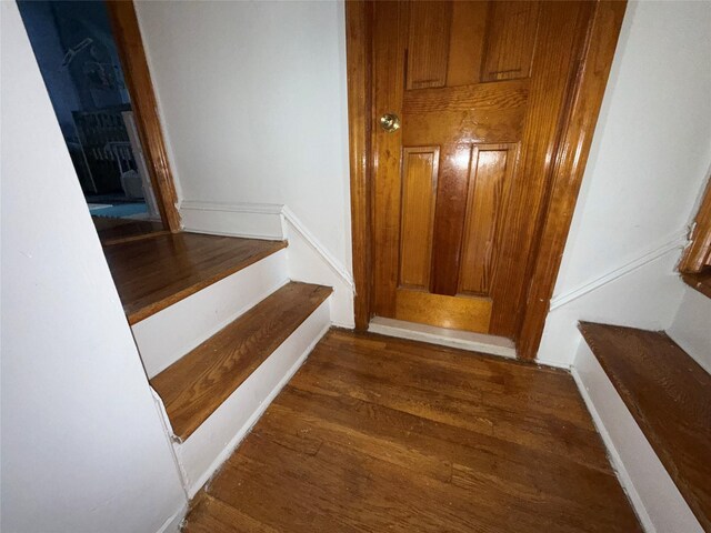 34-08 Murray Ln, Flushing, NY 11354 - stairway featuring wood finished floors and baseboards