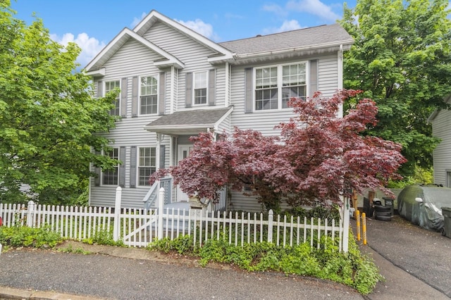 20 S St S, Highland Falls, NY 10928 - view of front of house featuring a shingled roof and a fenced front yard