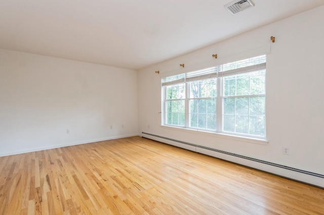 20 S St S, Highland Falls, NY 10928 - spare room with baseboard heating, wood finished floors, and baseboards