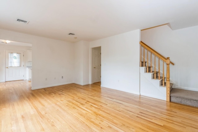 20 S St S, Highland Falls, NY 10928 - spare room with light wood-style flooring, stairs, and baseboards
