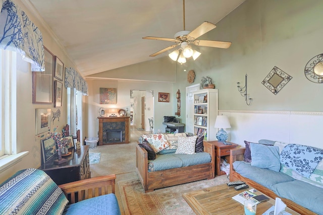 2 Mohican Rd, Newburgh, NY 12550 - living room featuring ceiling fan, vaulted ceiling, a fireplace, and light carpet