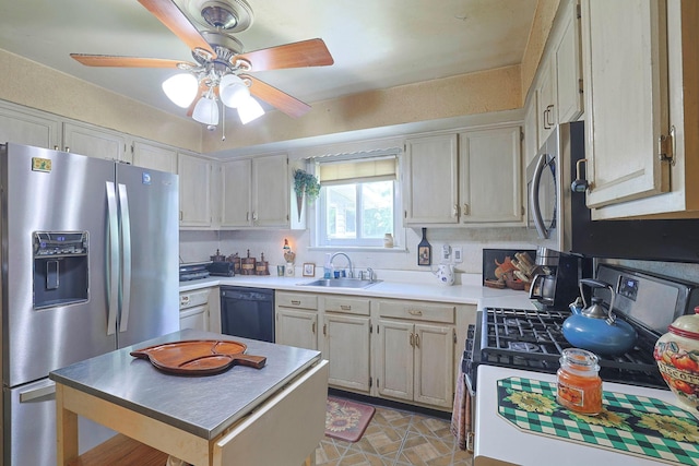 2 Mohican Rd, Newburgh, NY 12550 - kitchen featuring appliances with stainless steel finishes, a sink, ceiling fan, light countertops, and a center island