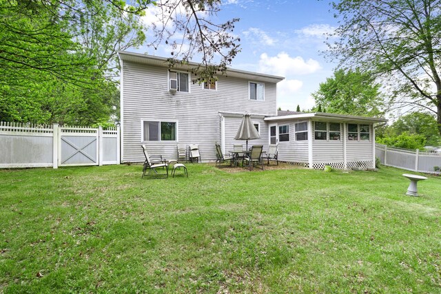 2 Mohican Rd, Newburgh, NY 12550 - back of house featuring a sunroom