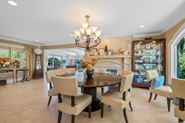 dining area featuring a chandelier, ornamental molding, healthy amount of natural light, light tile patterned flooring, and recessed lighting