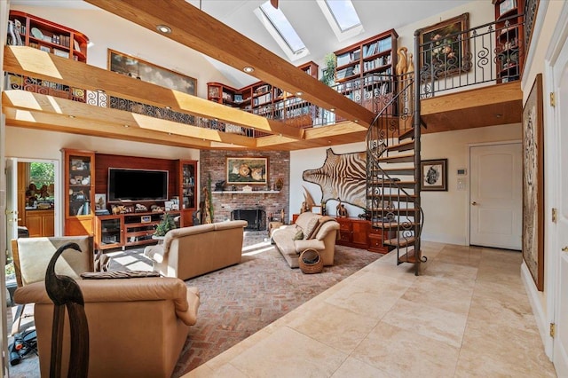 living room with a high ceiling, a skylight, stairway, a fireplace, and baseboards