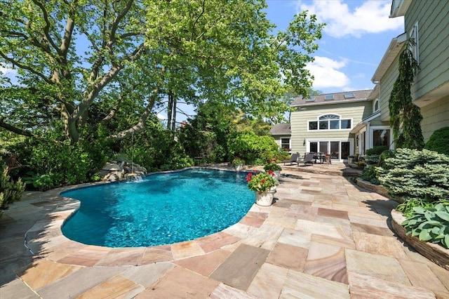 swimming pool featuring a patio