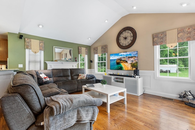 135 Ray Blvd, Poughkeepsie, NY 12603 - living area with a wainscoted wall, light wood-style flooring, plenty of natural light, high vaulted ceiling, and recessed lighting