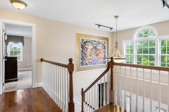 135 Ray Blvd, Poughkeepsie, NY 12603 - stairs featuring wood finished floors, plenty of natural light, and baseboards
