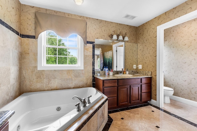 135 Ray Blvd, Poughkeepsie, NY 12603 - full bathroom with baseboards, a jetted tub, toilet, vanity, and inlaid floor details