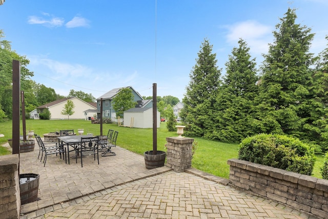 135 Ray Blvd, Poughkeepsie, NY 12603 - view of patio / terrace with outdoor dining area and an outbuilding