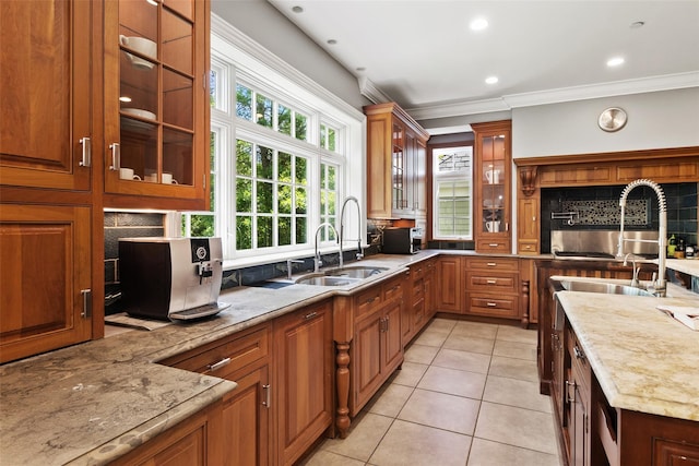 5 Club Way, Mount Kisco, NY 10549 - kitchen featuring a sink, decorative backsplash, light tile patterned floors, light stone counters, and ornamental molding