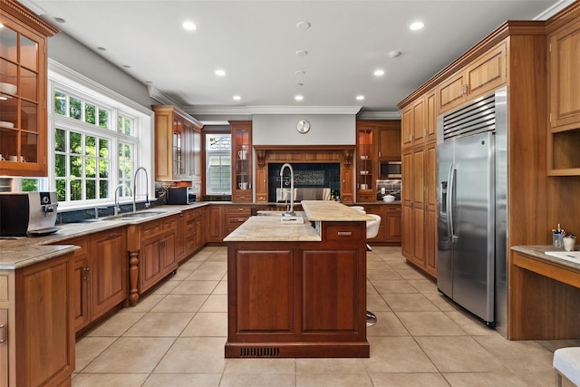 5 Club Way, Mount Kisco, NY 10549 - kitchen featuring built in appliances, a sink, an island with sink, recessed lighting, and light tile patterned flooring