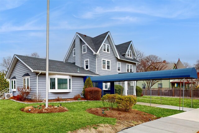 55 Teller Ave, Beacon, NY 12508 - view of front facade featuring a shingled roof and ac unit