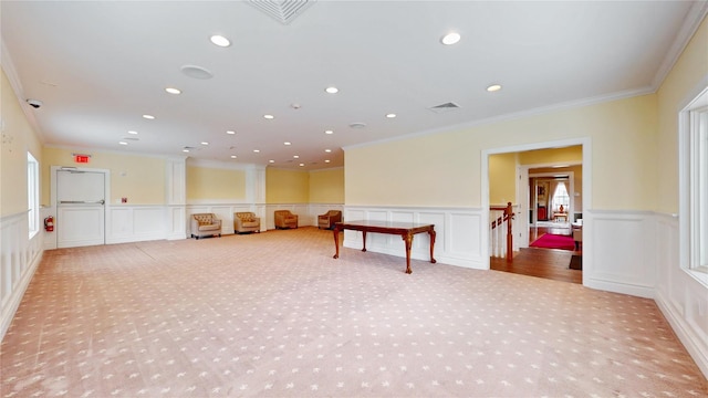 55 Teller Ave, Beacon, NY 12508 - spare room featuring carpet flooring, ornamental molding, a decorative wall, recessed lighting, and decorative columns