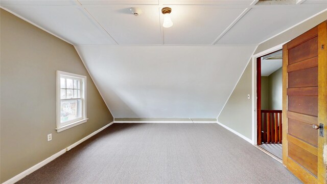 55 Teller Ave, Beacon, NY 12508 - carpeted empty room with vaulted ceiling, baseboards, and a smoke detector