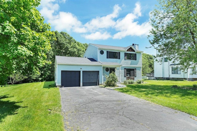 54 Capital Dr, Washingtonville, NY 10992 - view of front of house with a chimney, a garage, a front yard, and driveway