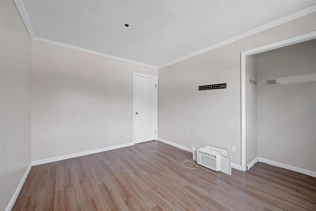 54 Capital Dr, Washingtonville, NY 10992 - spare room featuring wood finished floors, baseboards, and ornamental molding