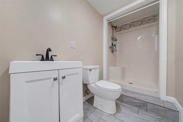 54 Capital Dr, Washingtonville, NY 10992 - full bath featuring walk in shower, toilet, baseboards, vanity, and marble finish floors