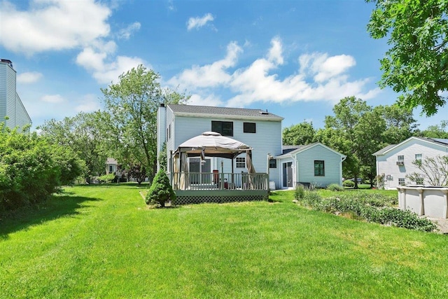 54 Capital Dr, Washingtonville, NY 10992 - rear view of house with a gazebo, a lawn, and a wooden deck