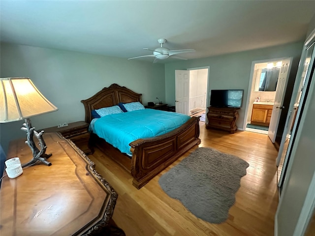 202 Doxbury Ln, Suffern, NY 10901 - bedroom with light wood-style flooring, connected bathroom, and ceiling fan
