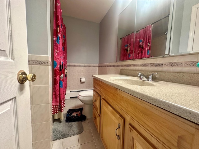 202 Doxbury Ln, Suffern, NY 10901 - bathroom featuring toilet, tile patterned flooring, vanity, tile walls, and a baseboard heating unit