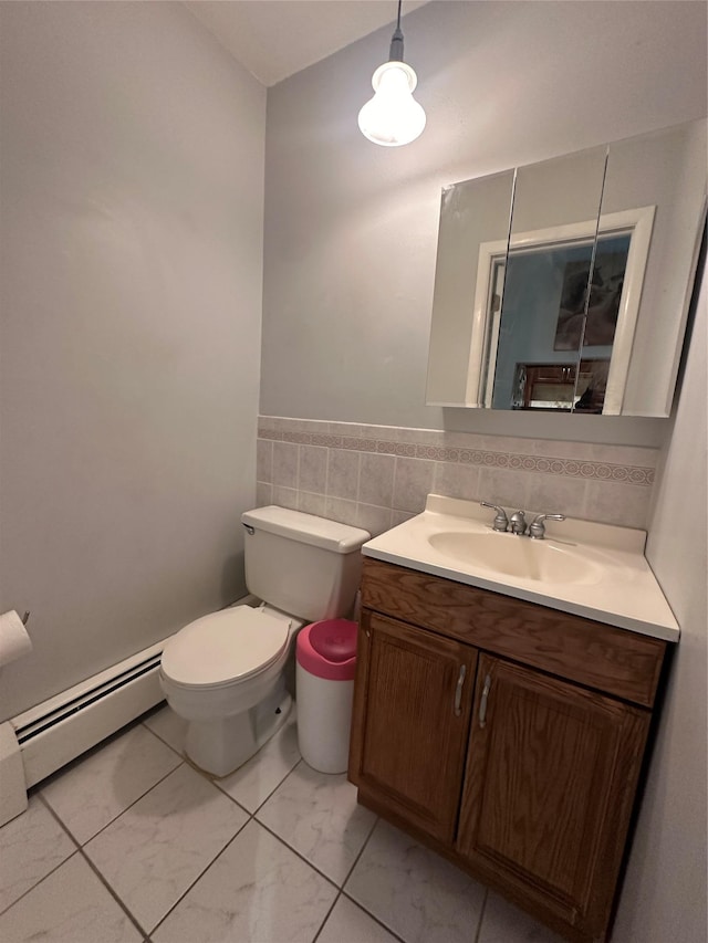 202 Doxbury Ln, Suffern, NY 10901 - half bath featuring baseboard heating, vanity, toilet, and marble finish flooring