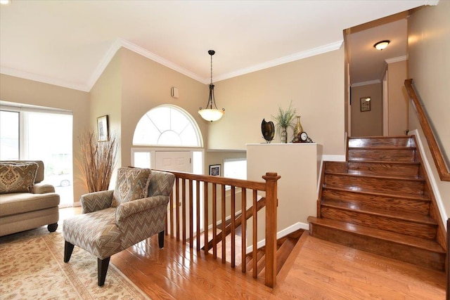 10 Linda Ln, Plainview, NY 11803 - stairs with wood finished floors, crown molding, baseboards, and lofted ceiling