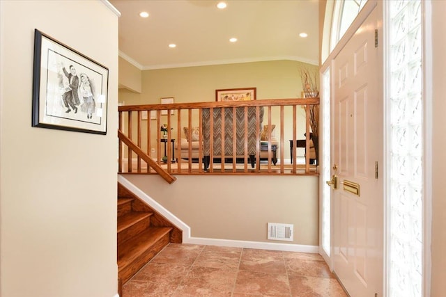 10 Linda Ln, Plainview, NY 11803 - foyer with crown molding, stairs, recessed lighting, and baseboards