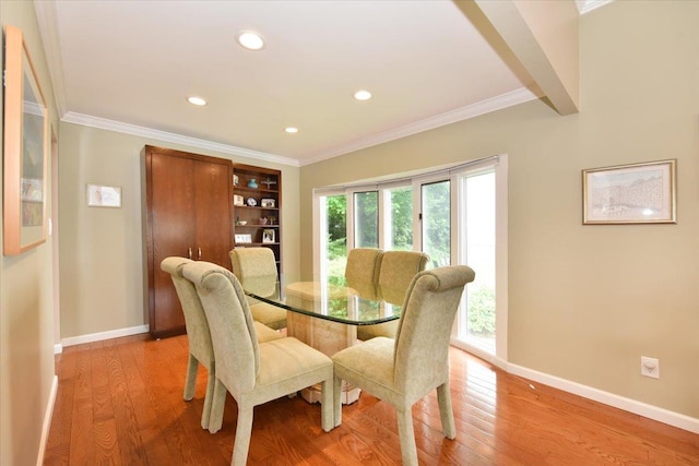 10 Linda Ln, Plainview, NY 11803 - dining room featuring light wood-type flooring, baseboards, ornamental molding, and recessed lighting