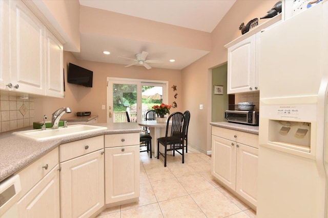 10 Linda Ln, Plainview, NY 11803 - kitchen featuring white fridge with ice dispenser, a sink, tasteful backsplash, ceiling fan, and recessed lighting