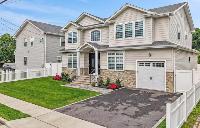 1427 Bellmore Rd, North Bellmore, NY 11710 - craftsman-style home featuring a garage, stone siding, and driveway